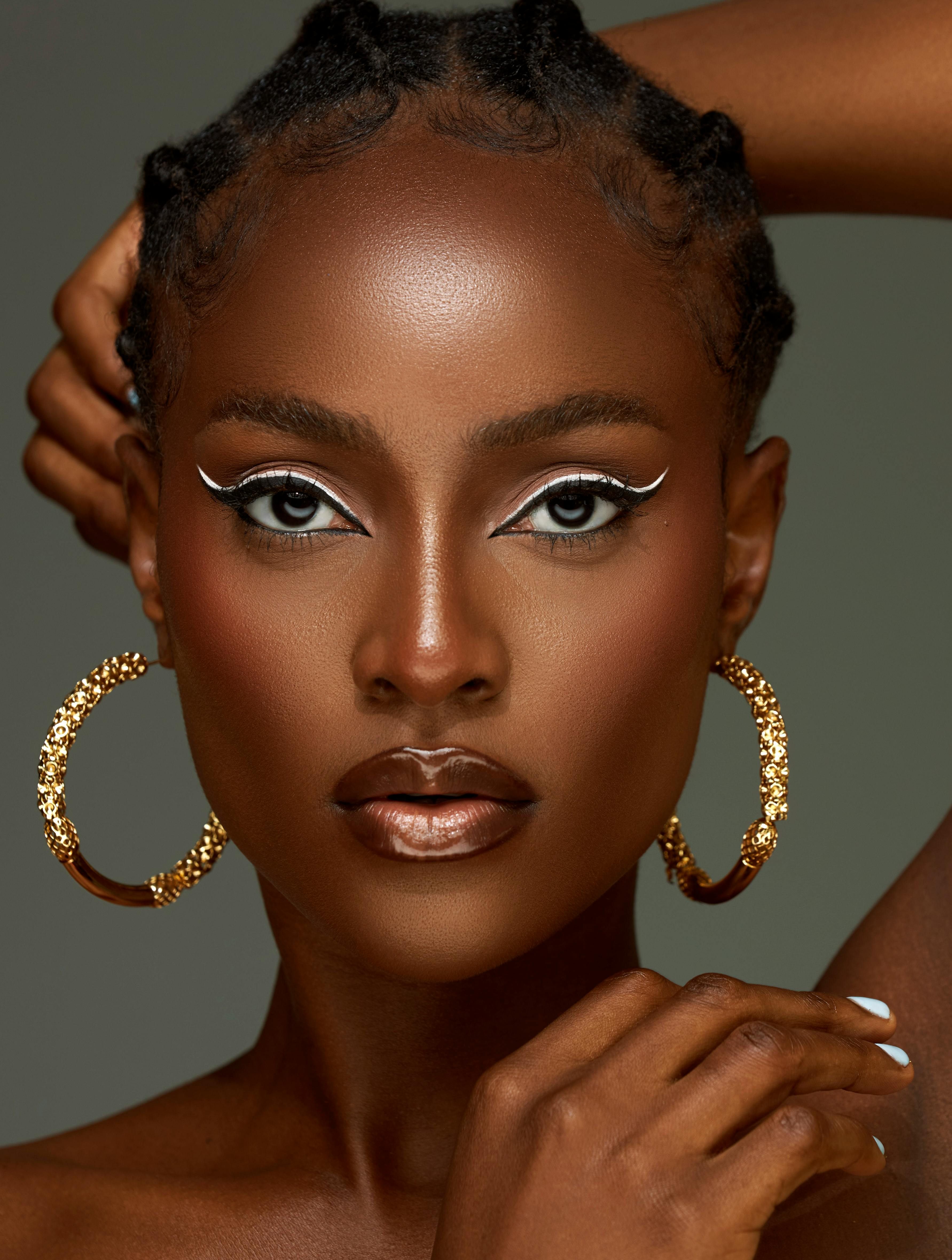 PRETTY GIRL WITH GOLD EARRINGS